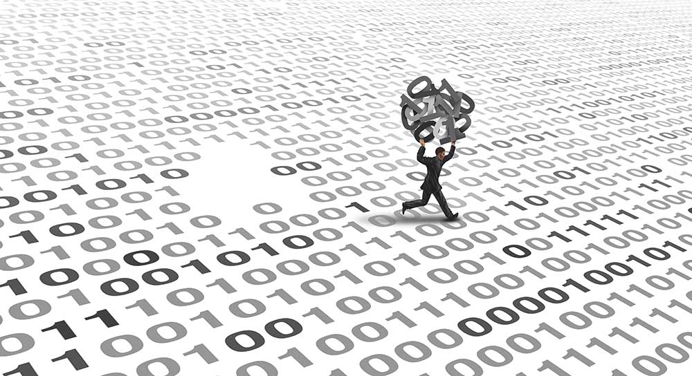 Graphic depicting a cybercriminal stealing data shown as 1s and 0s.